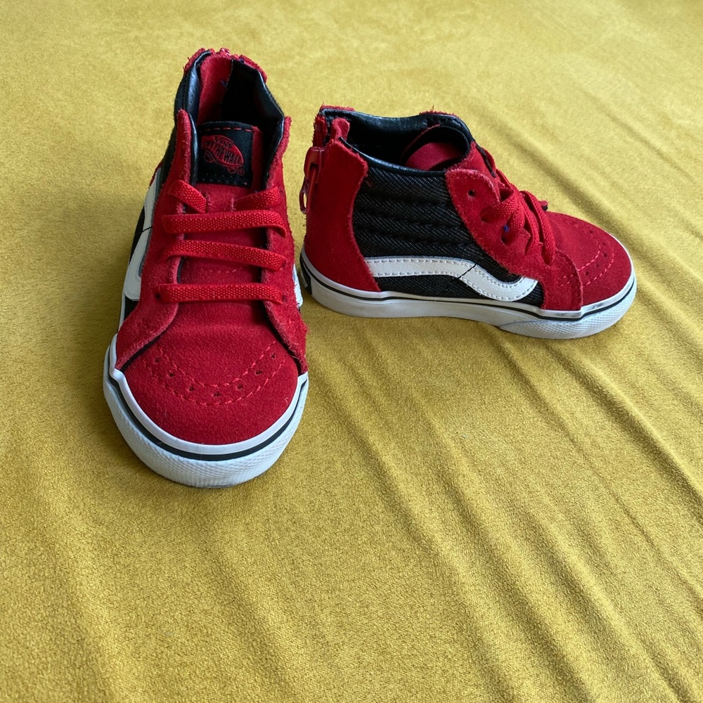 Vans 6.0 toddler black and red high tops
Great condition